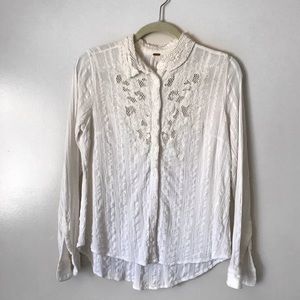 Free People Long sleeve button up shirt with lace.